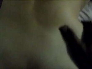 Blowing fluffy bunny in front of surfers at the beach